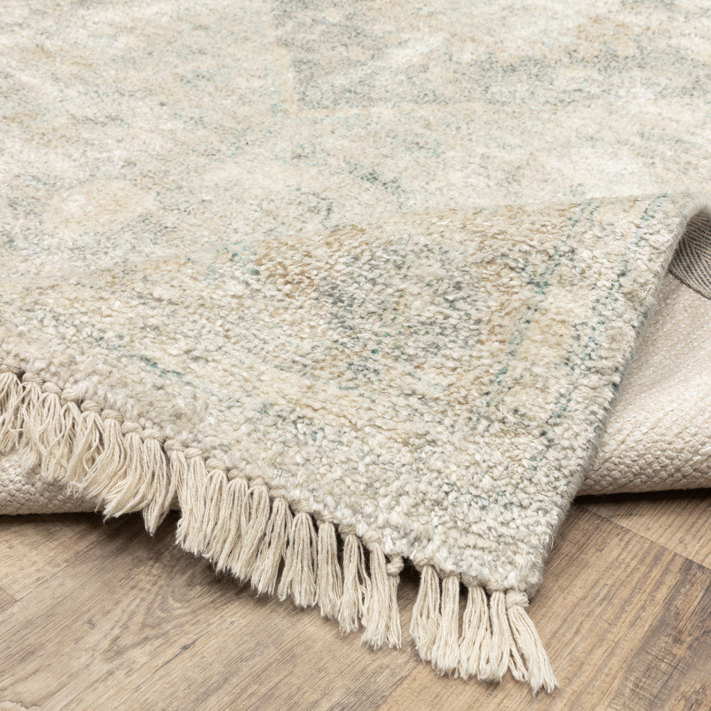 2' X 8' Beige And Grey Oriental Hand Loomed Stain Resistant Runner Rug With Fringe