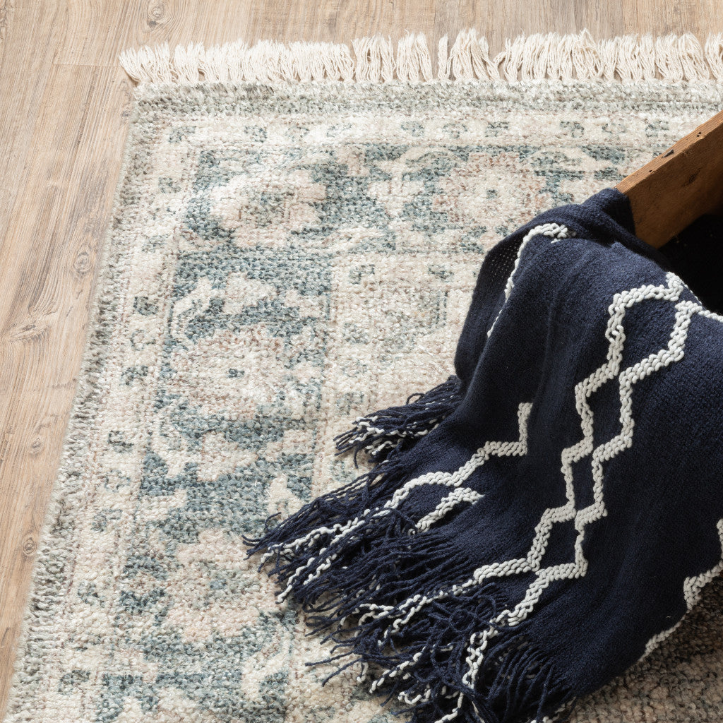 2' X 8' Beige And Grey Oriental Hand Loomed Stain Resistant Runner Rug With Fringe