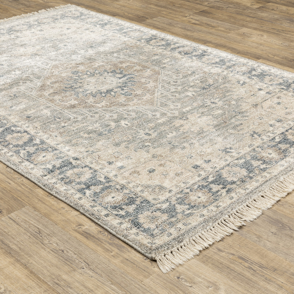 5' X 8' Beige And Grey Oriental Hand Loomed Stain Resistant Area Rug With Fringe