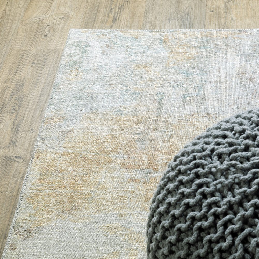 9' X 12' Yellow And Blue Abstract Area Rug