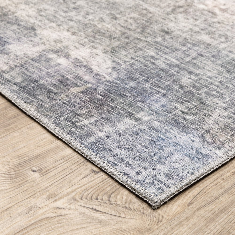 9' X 12' Blue And Beige Abstract Distressed Area Rug