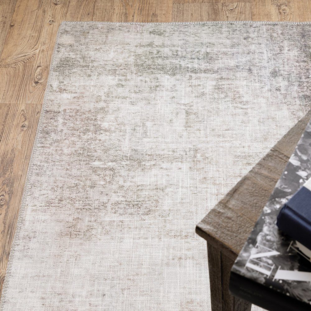 9' X 12' Blue And Beige Abstract Distressed Area Rug
