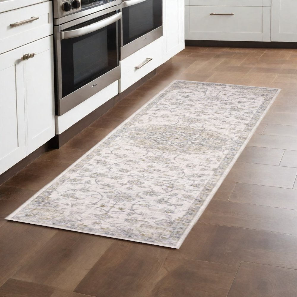 8' Beige And Gold Oriental Distressed Runner Rug