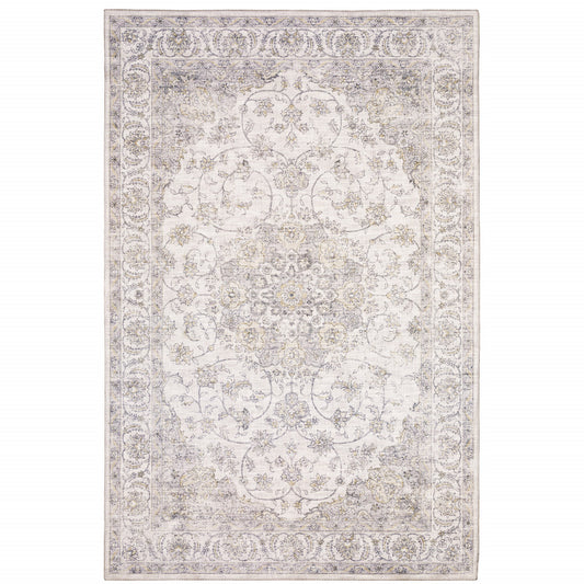 5' X 7' Beige Gold And Grey Oriental Power Loom Stain Resistant Area Rug