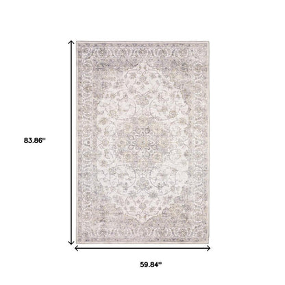 5' X 7' Beige Gold And Grey Oriental Power Loom Stain Resistant Area Rug