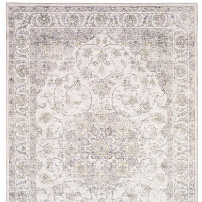 5' X 7' Beige Gold And Grey Oriental Power Loom Stain Resistant Area Rug