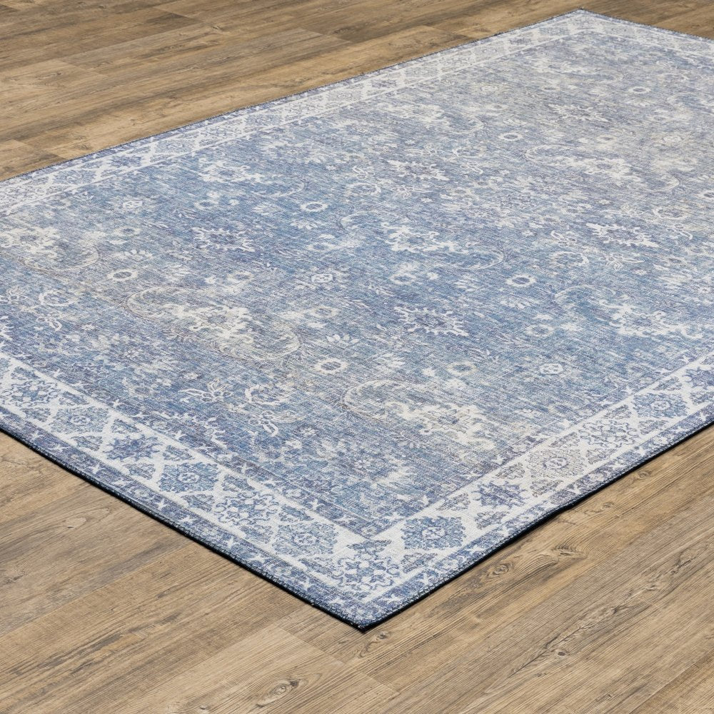 8' X 10' Blue And Ivory Oriental Distressed Area Rug