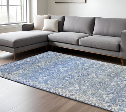 9' X 12' Blue And Ivory Oriental Distressed Area Rug
