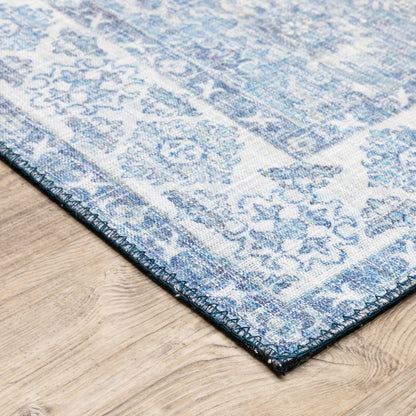 9' X 12' Blue And Ivory Oriental Distressed Area Rug