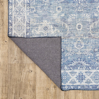 9' X 12' Blue And Ivory Oriental Distressed Area Rug