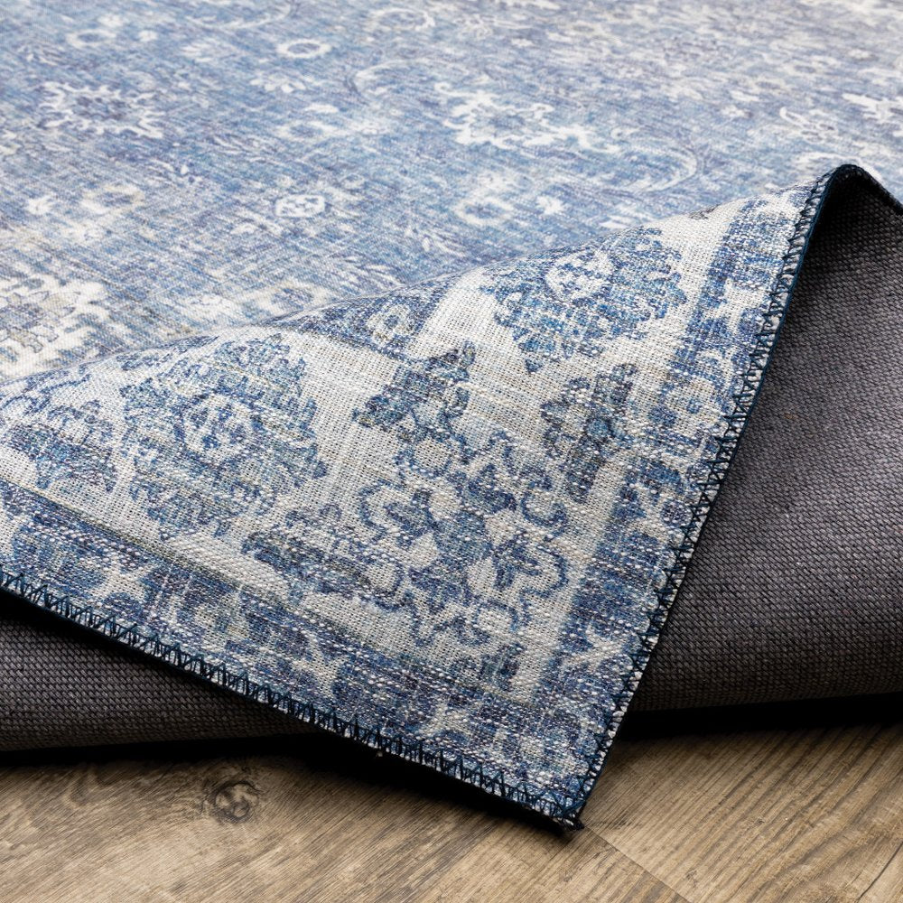 9' X 12' Blue And Ivory Oriental Distressed Area Rug