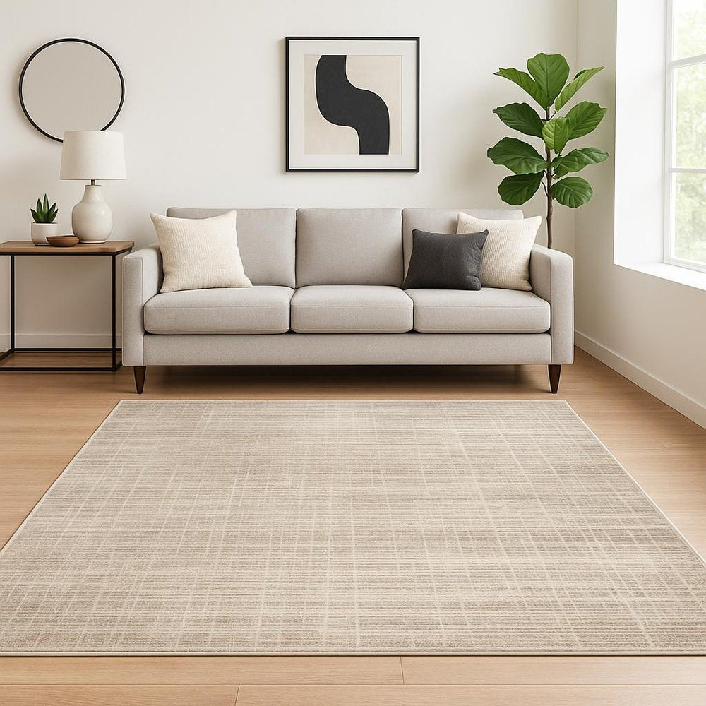 6' X 9' Beige Grey Ivory Tan And Brown Abstract Power Loom Stain Resistant Area Rug