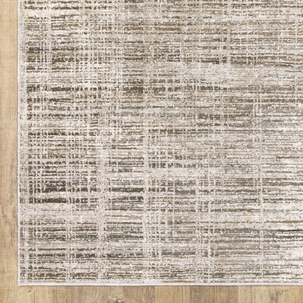 6' X 9' Beige Grey Ivory Tan And Brown Abstract Power Loom Stain Resistant Area Rug