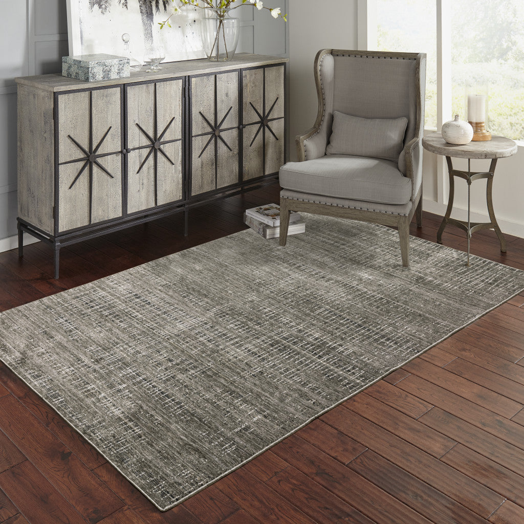 8' X 11' Charcoal Grey Grey Ivory Tan And Brown Abstract Power Loom Stain Resistant Area Rug