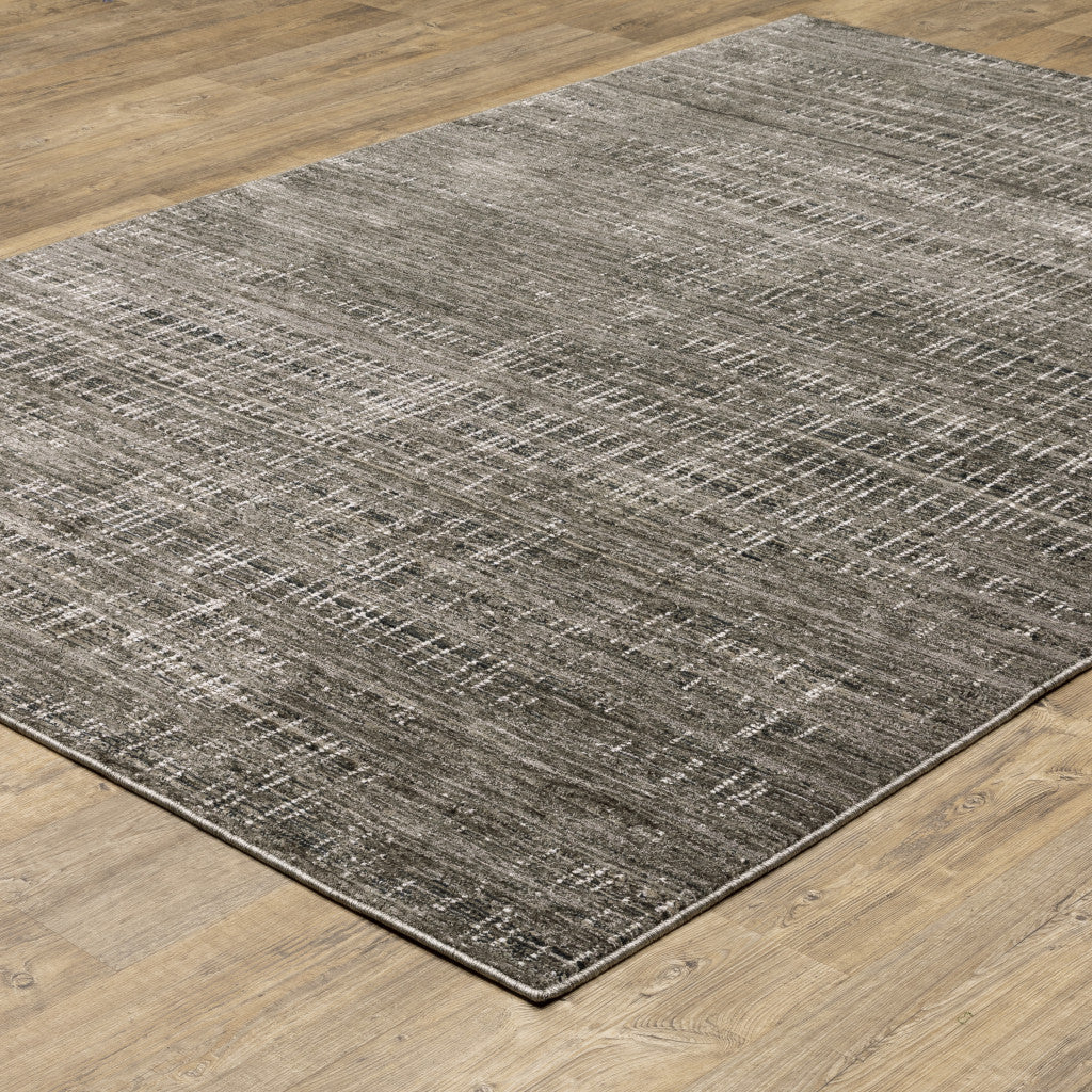 8' X 11' Charcoal Grey Grey Ivory Tan And Brown Abstract Power Loom Stain Resistant Area Rug