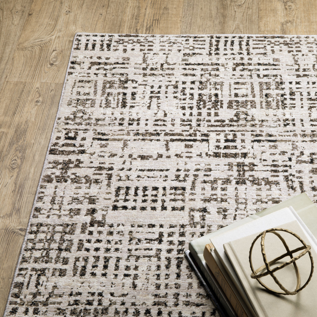 2' X 8' Ivory Grey Charcoal Brown And Beige Abstract Power Loom Stain Resistant Runner Rug