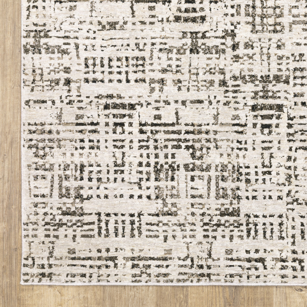 5' X 8' Ivory Grey Charcoal Brown And Beige Abstract Power Loom Stain Resistant Area Rug