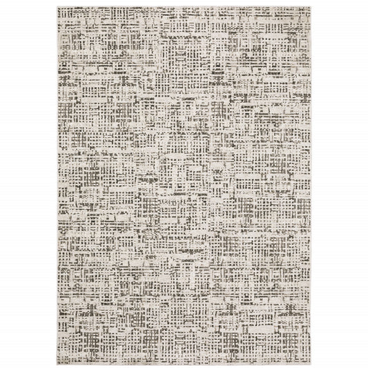 6' X 9' Ivory Grey Charcoal Brown And Beige Abstract Power Loom Stain Resistant Area Rug