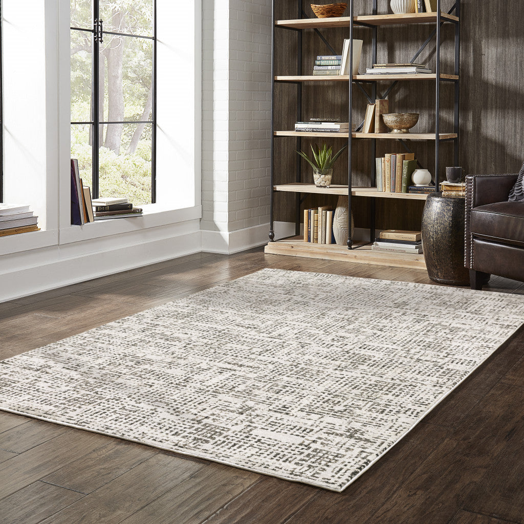 6' X 9' Ivory Grey Charcoal Brown And Beige Abstract Power Loom Stain Resistant Area Rug