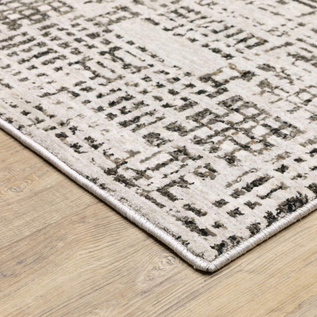 7' X 10' Gray and Ivory Abstract Power Loom Area Rug