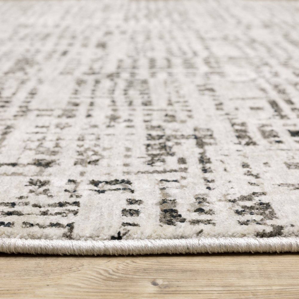 7' X 10' Ivory And Gray Abstract Area Rug