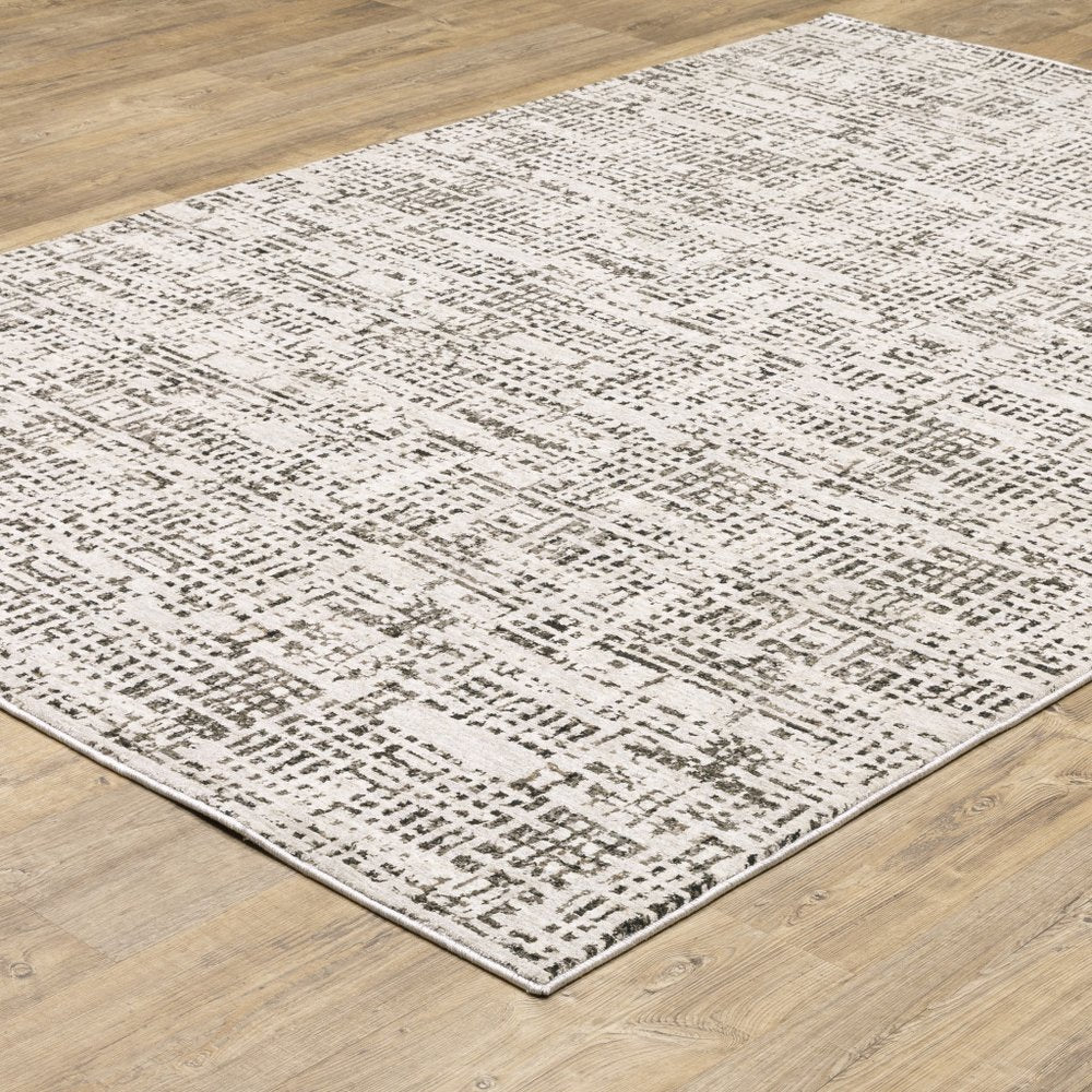 7' X 10' Ivory And Gray Abstract Area Rug