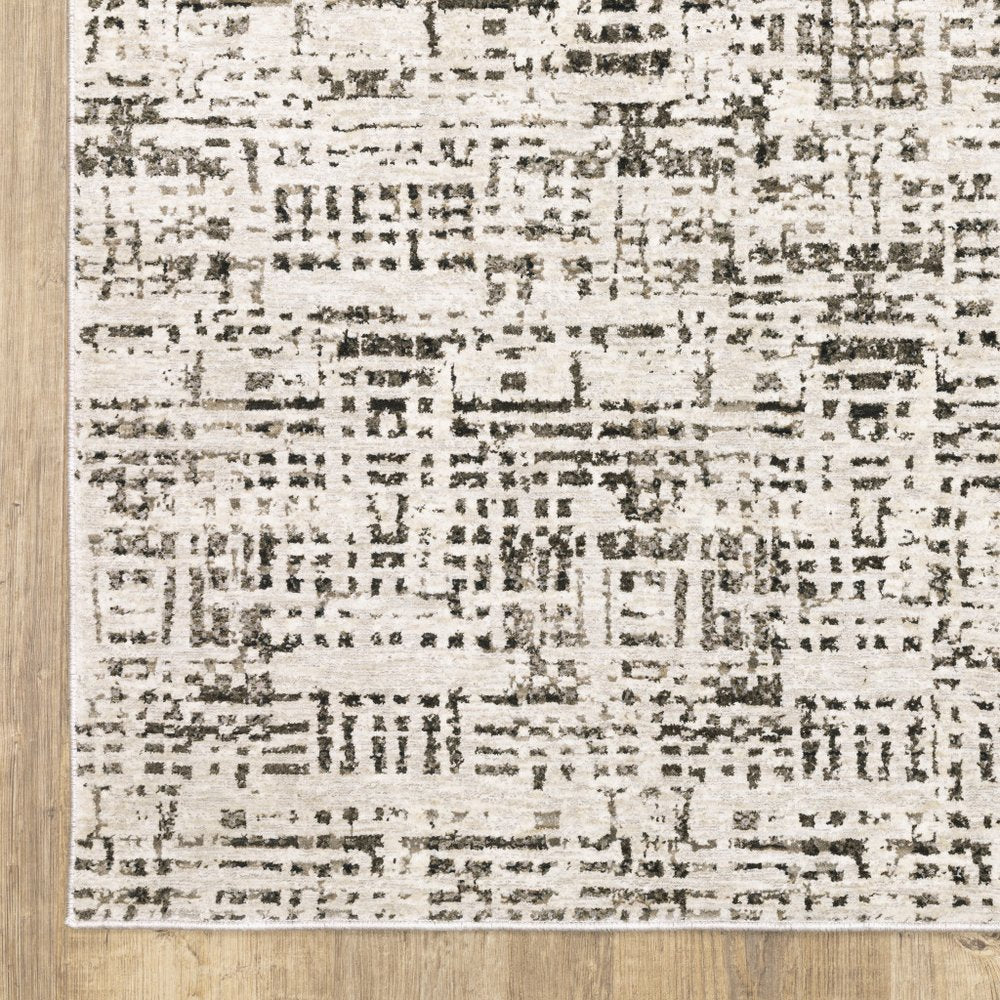 7' X 10' Ivory And Gray Abstract Area Rug