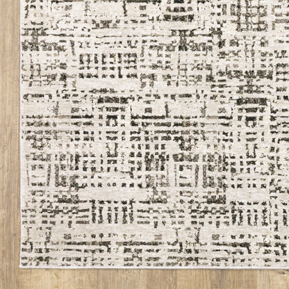 7' X 10' Ivory And Gray Abstract Area Rug