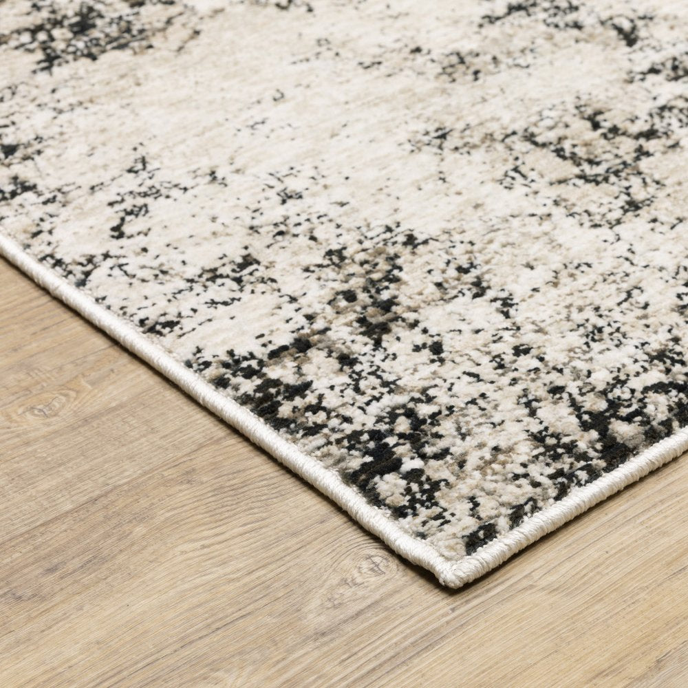7' X 10' Ivory And Gray Abstract Area Rug