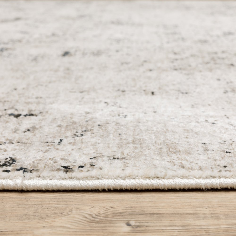 7' X 10' Ivory And Gray Abstract Area Rug