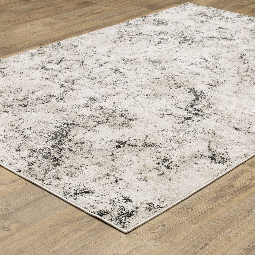 7' X 10' Ivory And Gray Abstract Area Rug