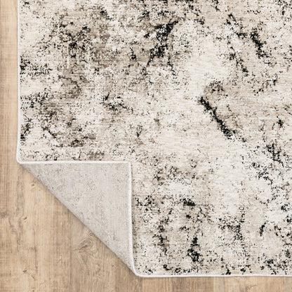 7' X 10' Ivory And Gray Abstract Area Rug