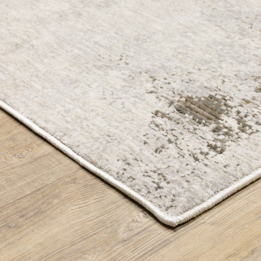 7' X 10' Ivory And Beige Abstract Distressed Area Rug
