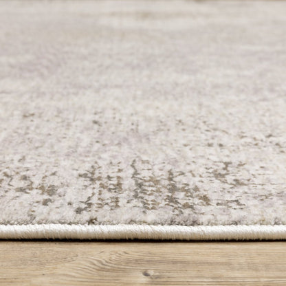 7' X 10' Ivory And Beige Abstract Distressed Area Rug