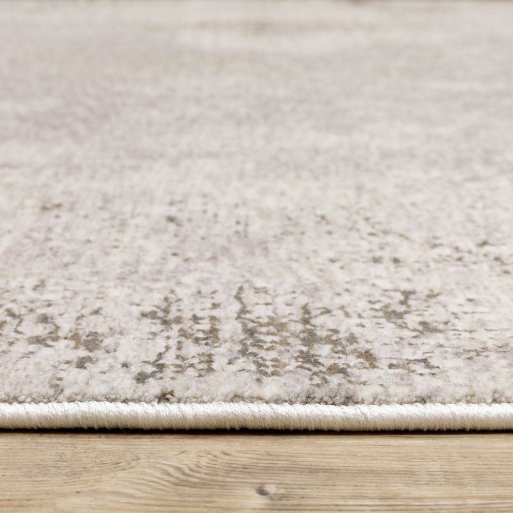 7' X 10' Ivory And Beige Abstract Distressed Area Rug