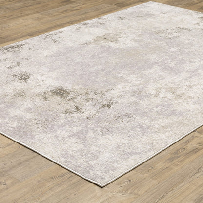 7' X 10' Ivory And Beige Abstract Distressed Area Rug