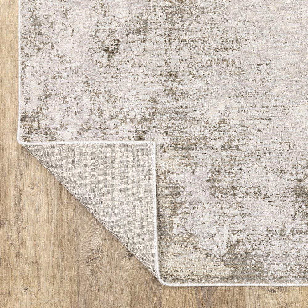 7' X 10' Ivory And Beige Abstract Distressed Area Rug