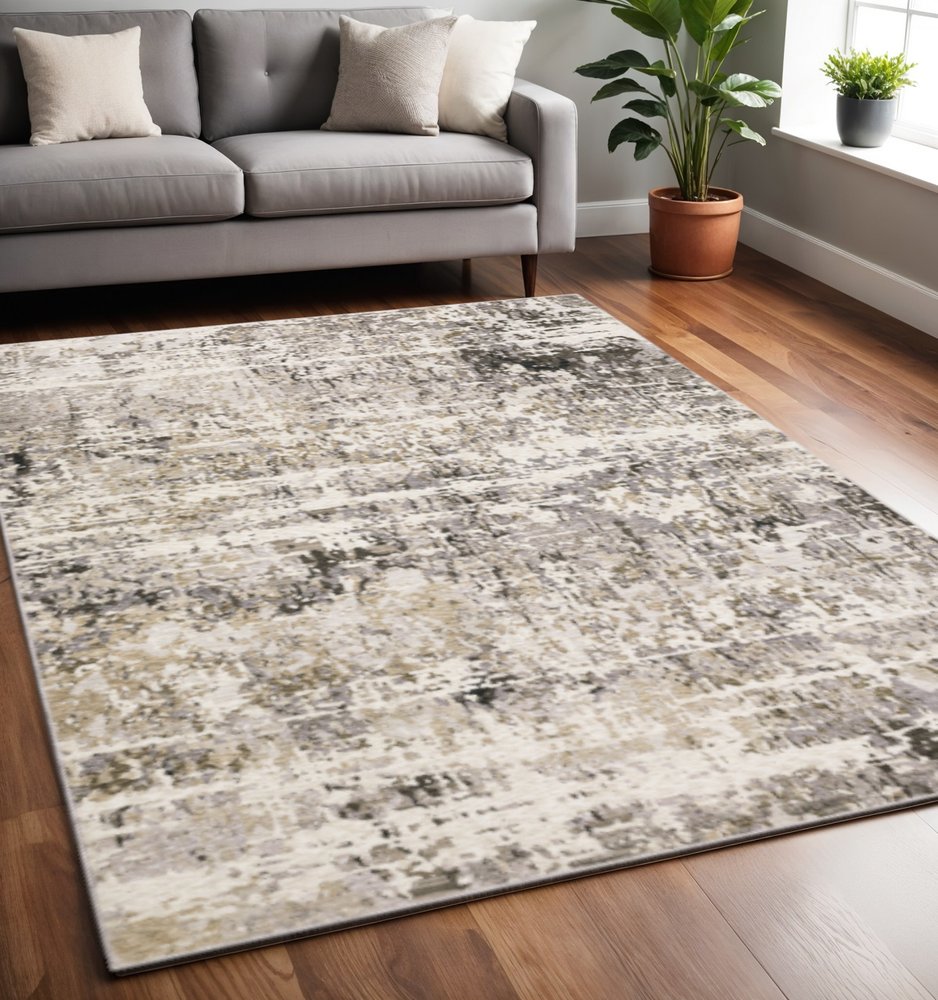 5' X 8' Grey Ivory Beige Charcoal Black Tan And Brown Abstract Power Loom Stain Resistant Area Rug