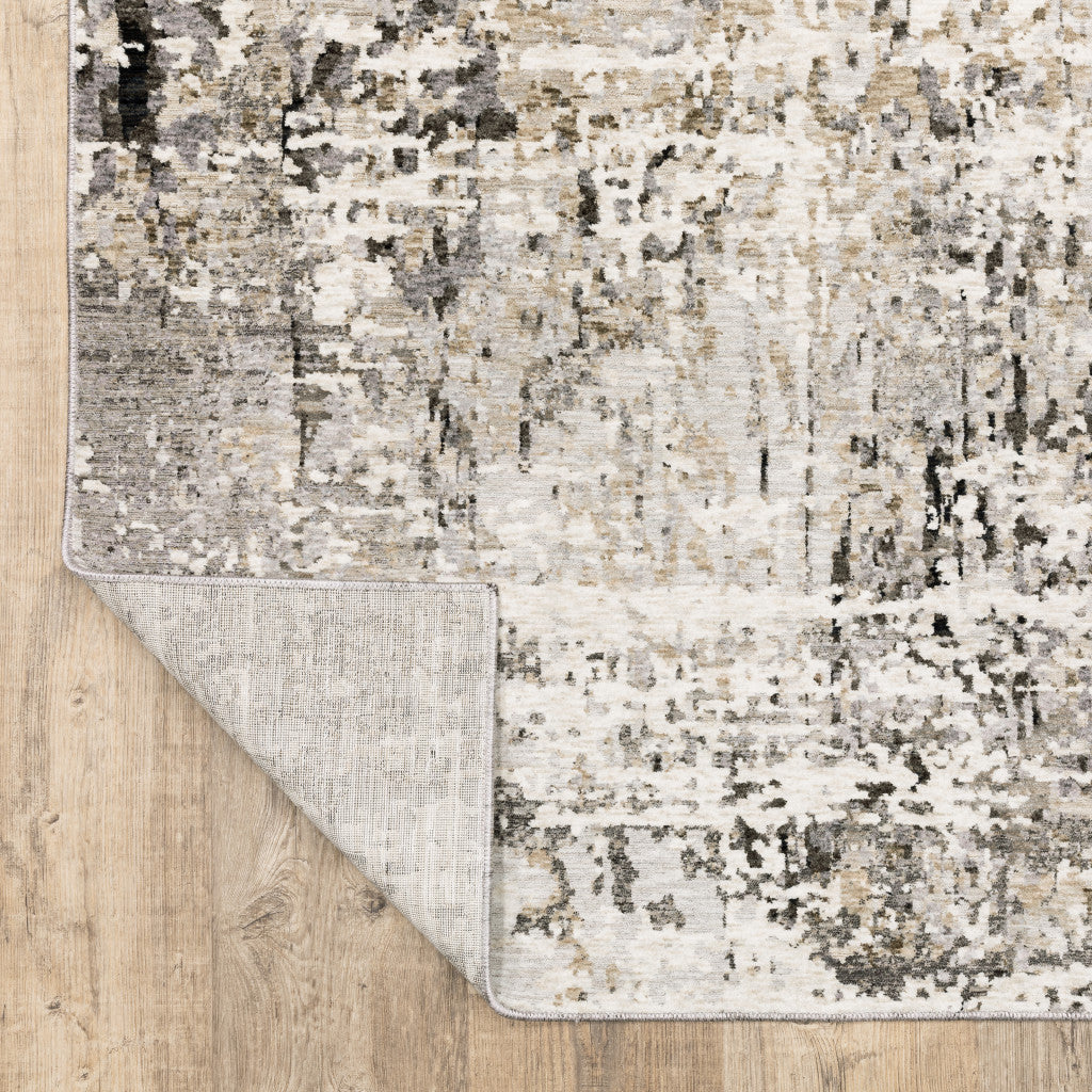 5' X 8' Grey Ivory Beige Charcoal Black Tan And Brown Abstract Power Loom Stain Resistant Area Rug