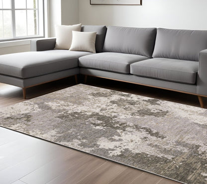 7' X 10' Gray And Ivory Abstract Distressed Area Rug