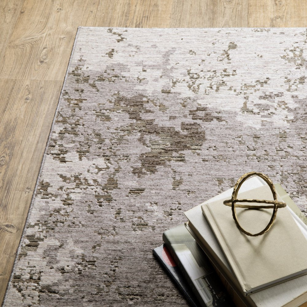 7' X 10' Gray And Ivory Abstract Distressed Area Rug
