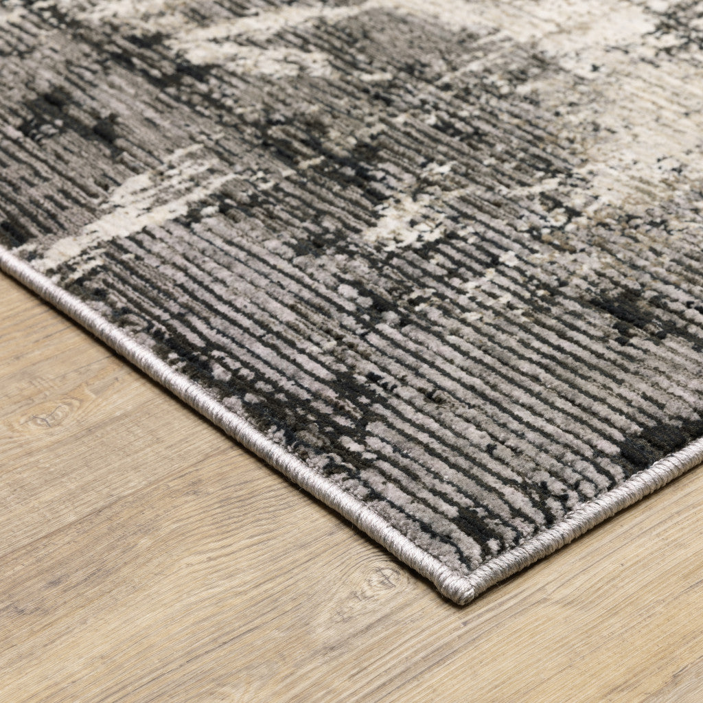 2' X 8' Grey Ivory Charcoal Tan Black And Beige Abstract Power Loom Stain Resistant Runner Rug