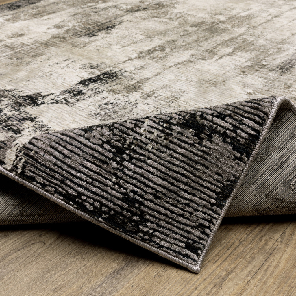 2' X 8' Grey Ivory Charcoal Tan Black And Beige Abstract Power Loom Stain Resistant Runner Rug