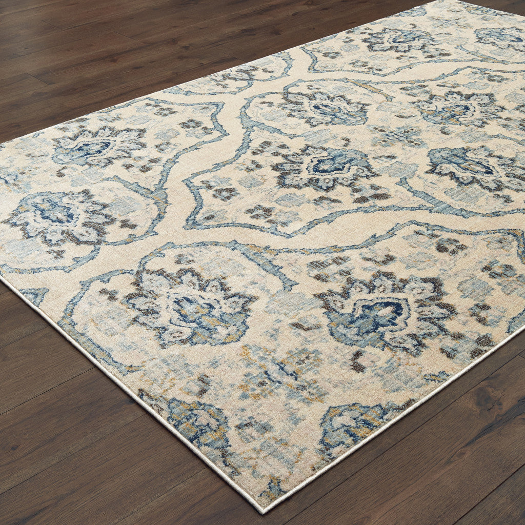 4' X 6' Ivory And Blue Floral Power Loom Stain Resistant Area Rug