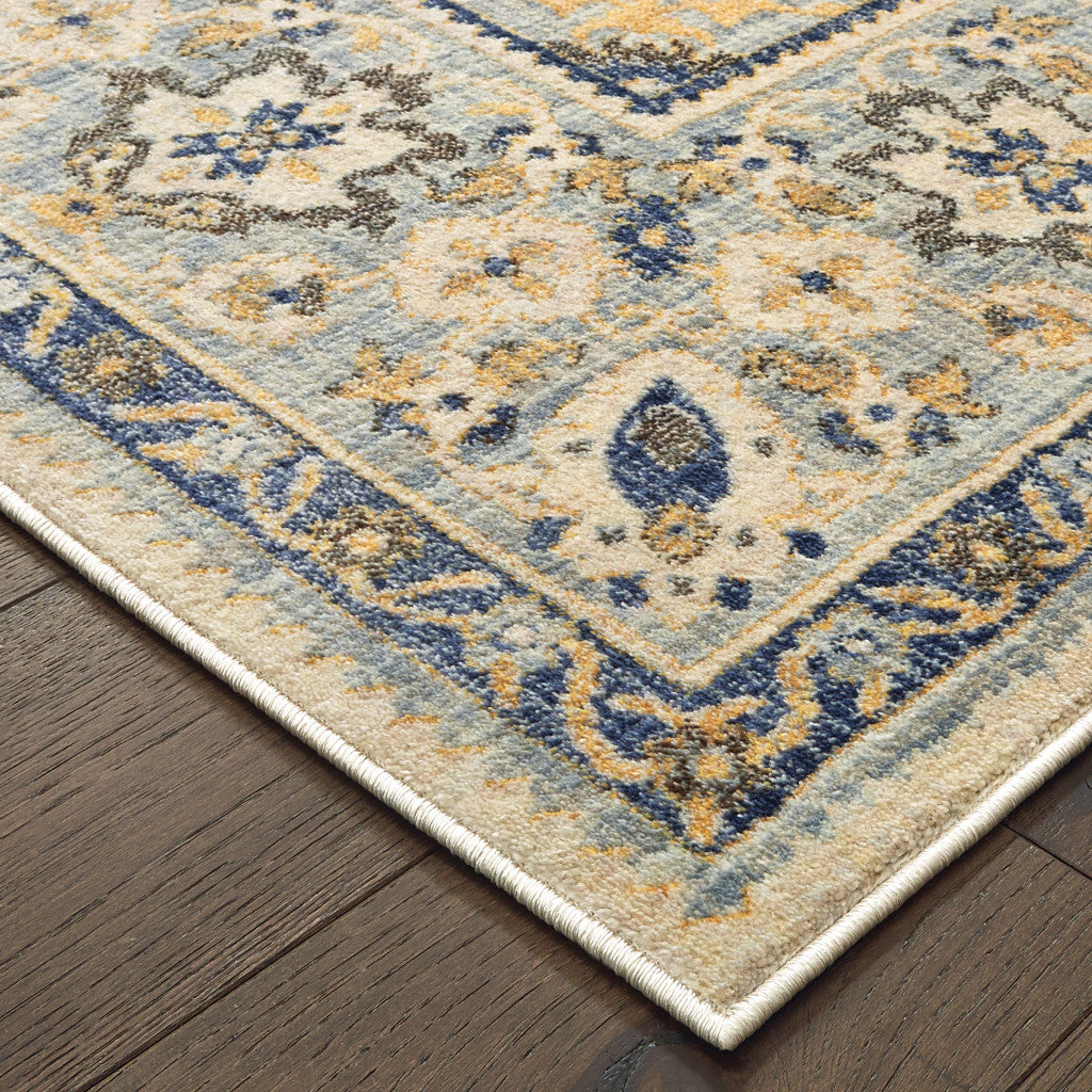 5' X 8' Ivory And Blue Oriental Power Loom Stain Resistant Area Rug