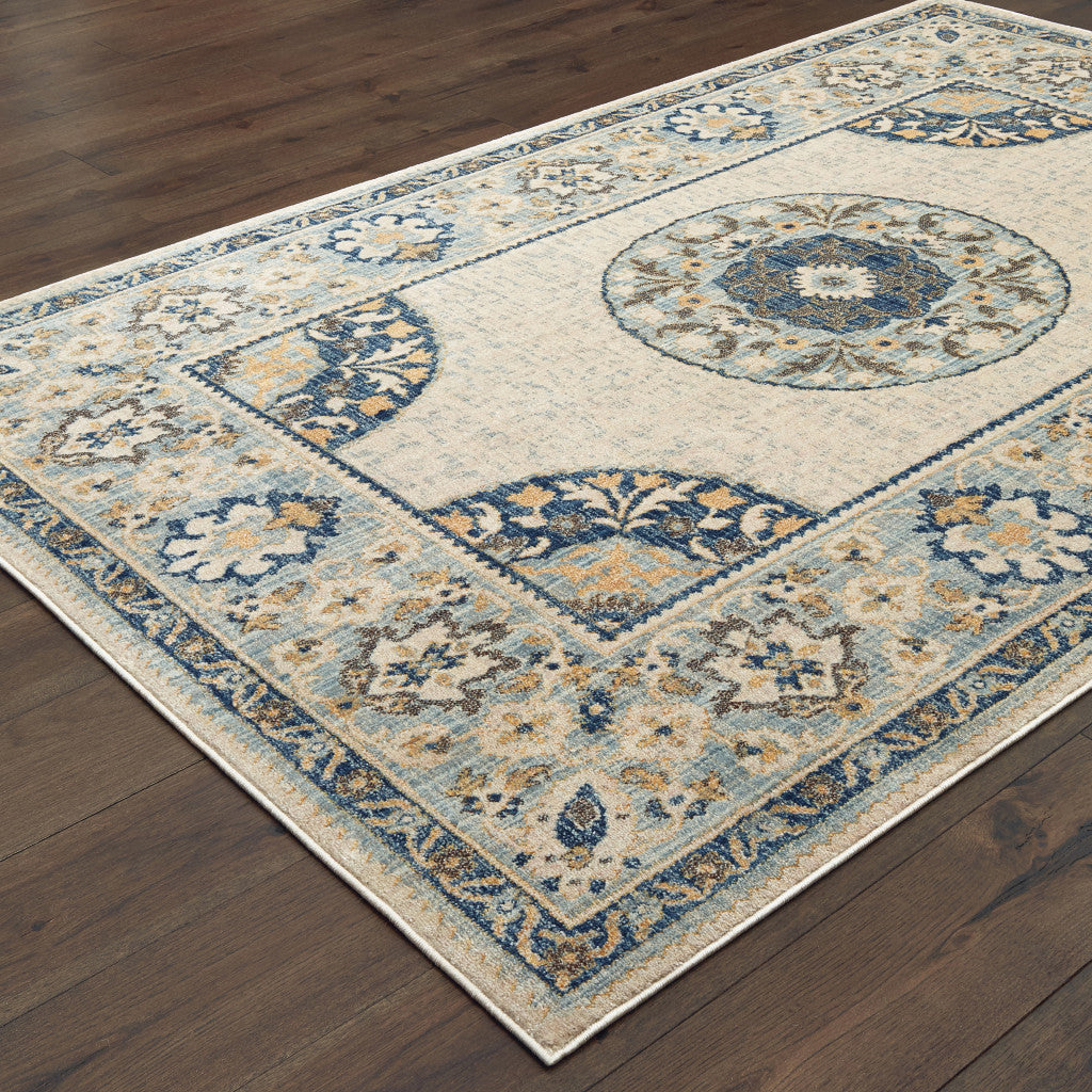 5' X 8' Ivory And Blue Oriental Power Loom Stain Resistant Area Rug