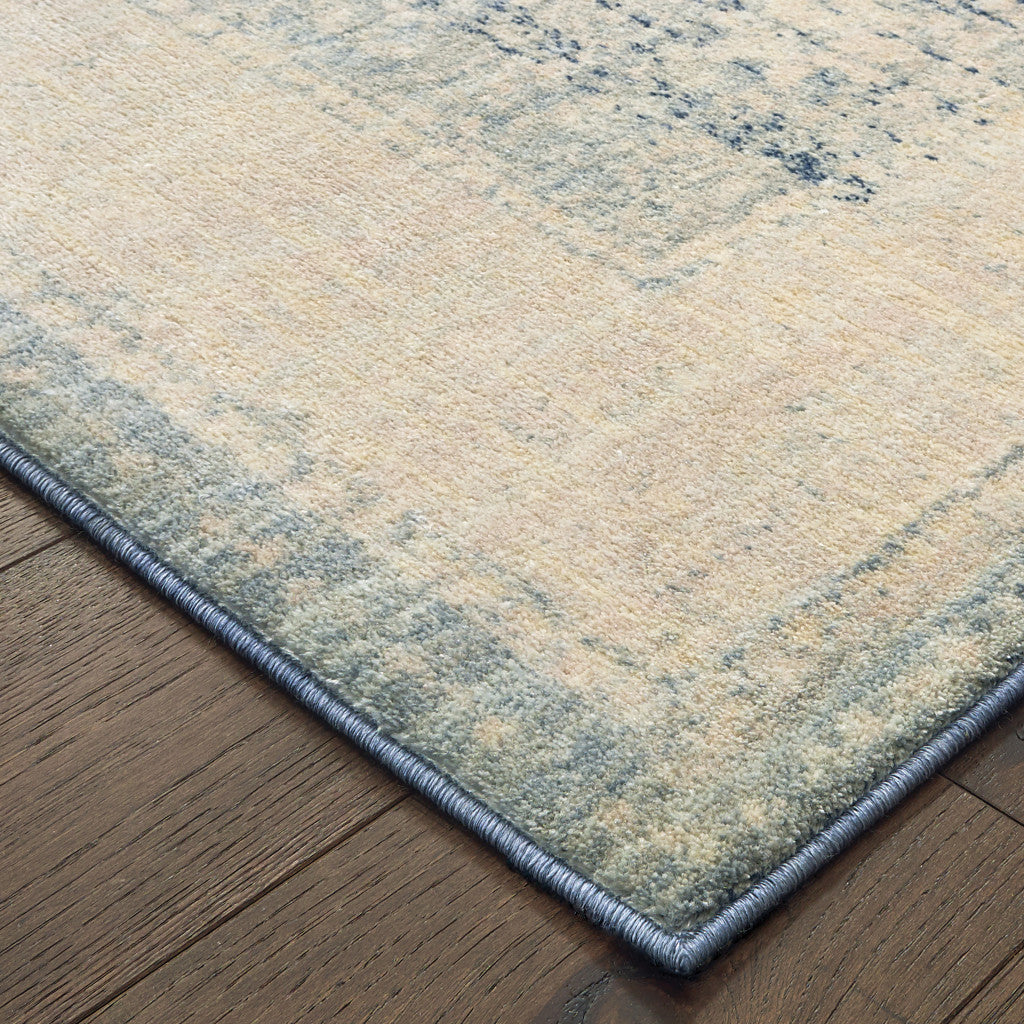 5' X 8' Ivory And Blue Oriental Power Loom Stain Resistant Area Rug