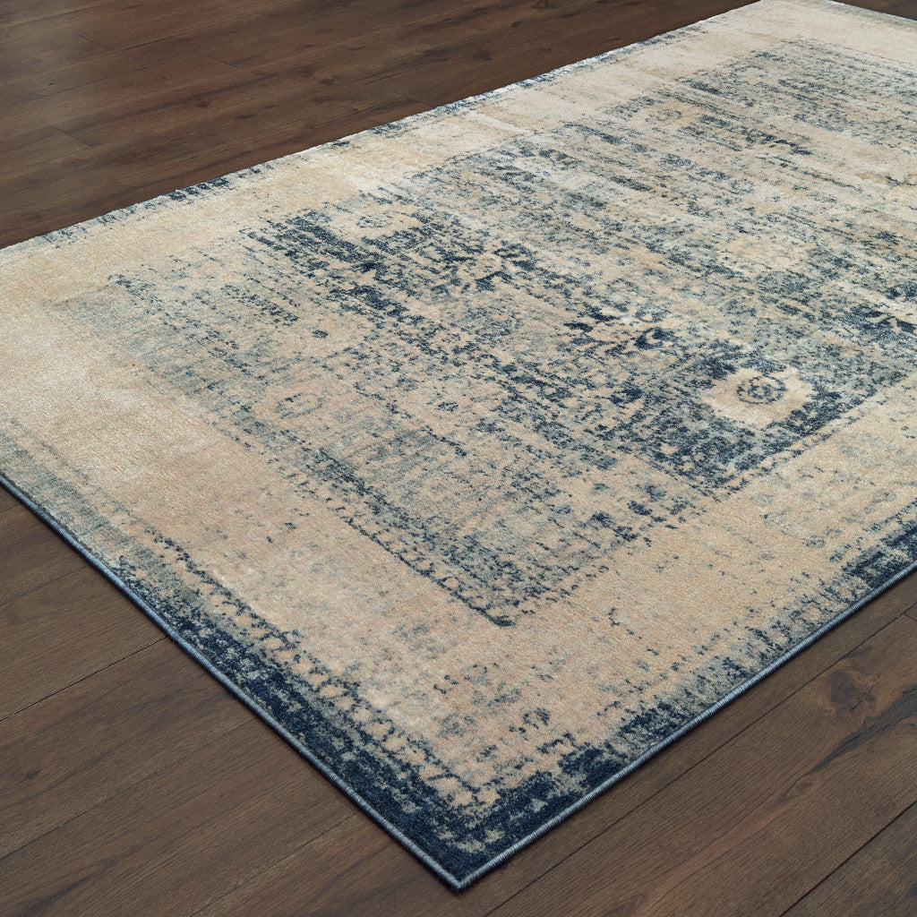 5' X 8' Ivory And Blue Oriental Power Loom Stain Resistant Area Rug