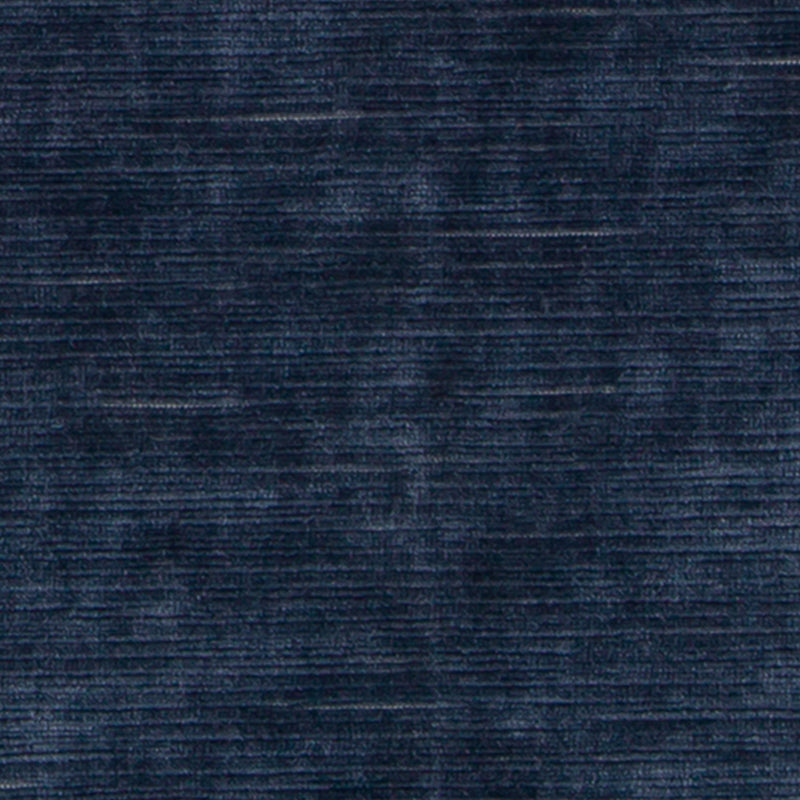Indigo velvet fabric swatch with subtle sheen and linear texture.