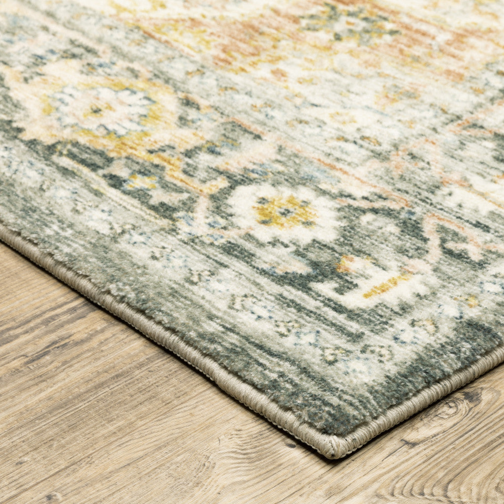 5' X 7' Grey Gold Orange And Ivory Oriental Power Loom Stain Resistant Area Rug